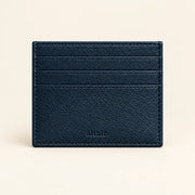 Closed navy ALTAIR leather cardholder with the ALTAIR logo